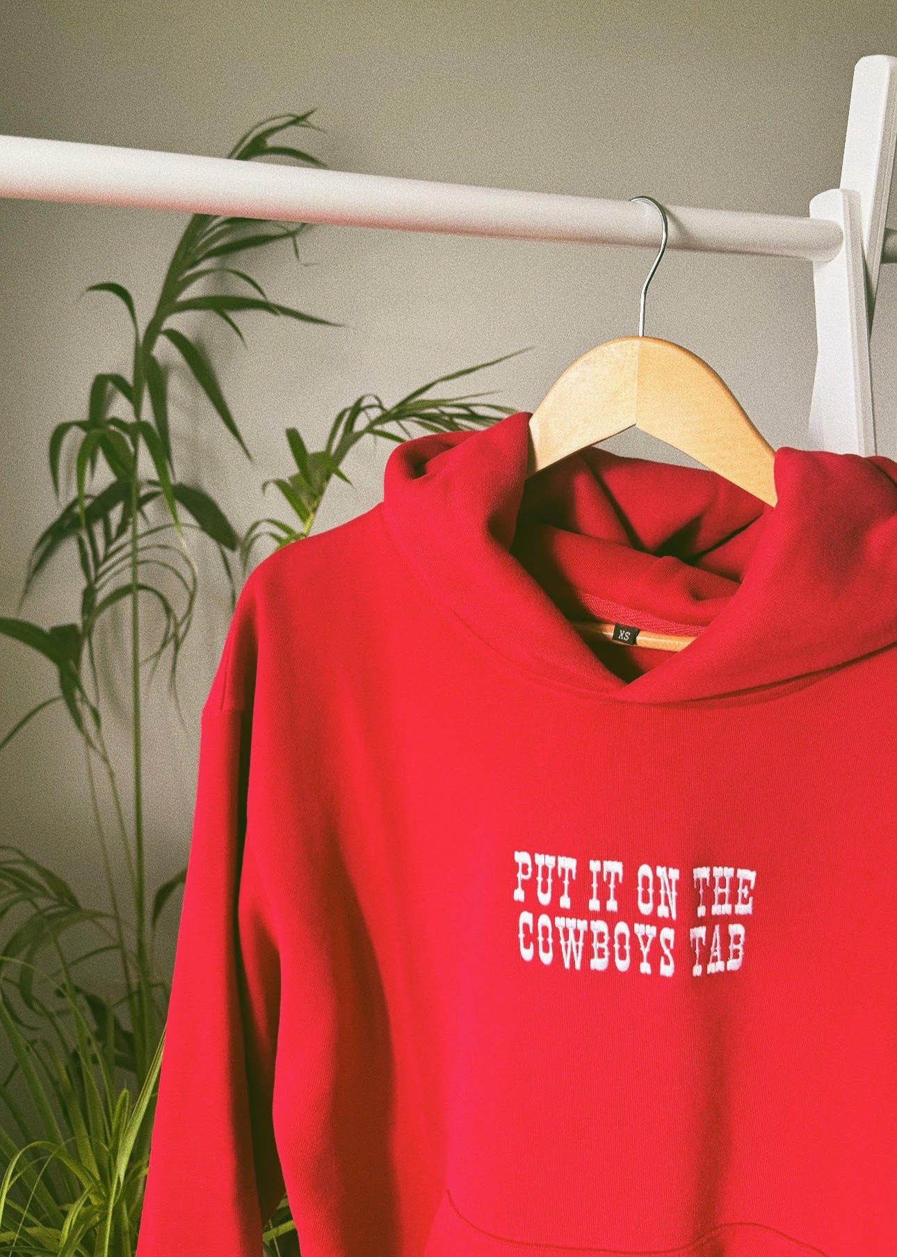 LIMITED EDITION RED Put It on the Cowboy’s Tab™ Hoodie